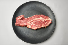 Grassfed beef chuck steak on bone