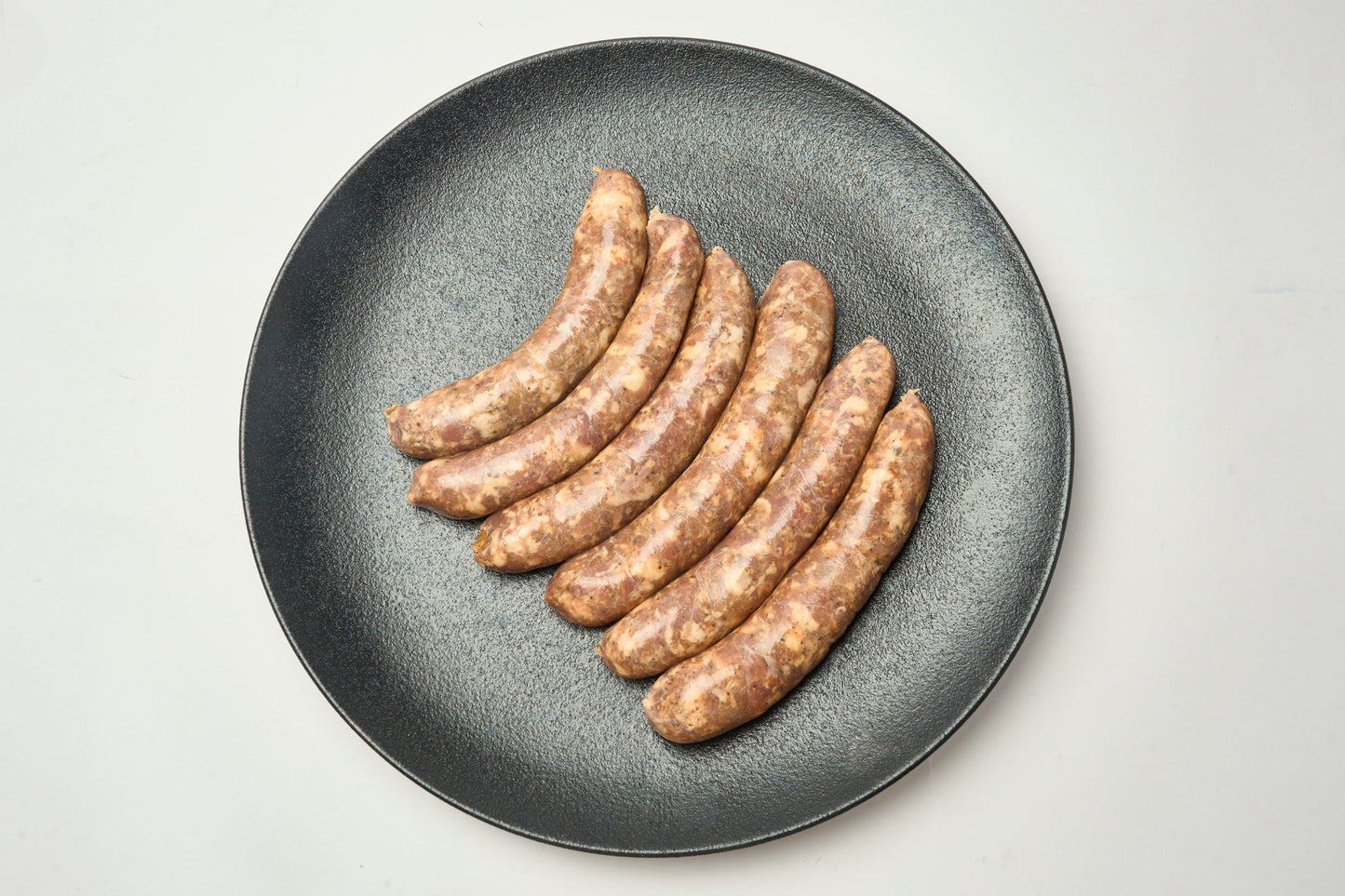 Pork sausages with caramelised pear & cracked pepper 500g